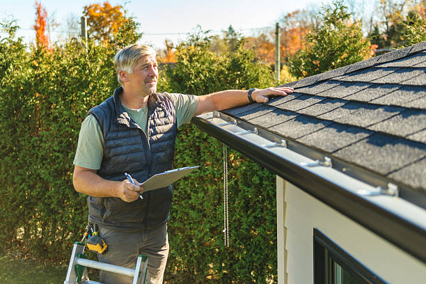 Professional Roof Repair technician working in Evart, MI